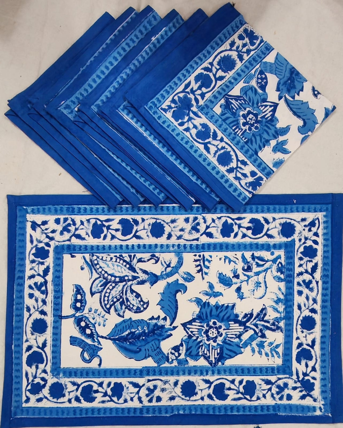 Blue floral block print table mat set with matching napkins