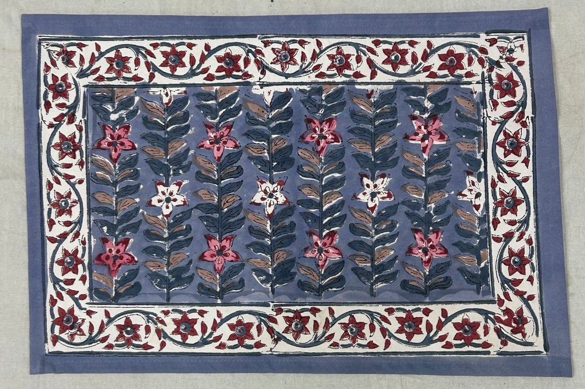 Hand block printed floral table mat in slate blue and crimson
