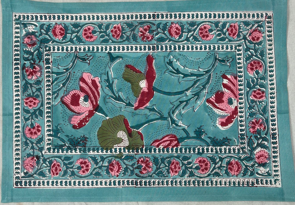 Hand block printed poppy table mat in teal and crimson