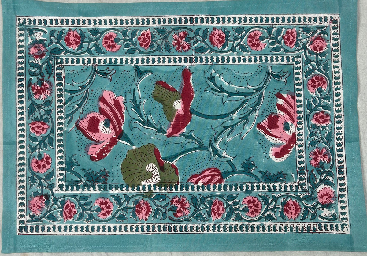 Hand block printed poppy table mat in teal and crimson